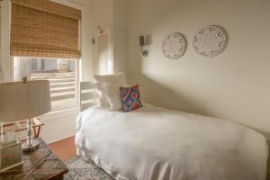 Voodi või voodid majutusasutuse Sage Hill Inn & Spa toas