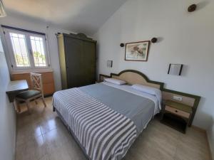 Posteľ alebo postele v izbe v ubytovaní 2 Calle las Azucenas