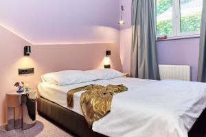 Posteľ alebo postele v izbe v ubytovaní Stay Swanky Hostel