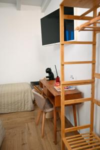 TV a/nebo společenská místnost v ubytování Serenity Apulian Rooms
