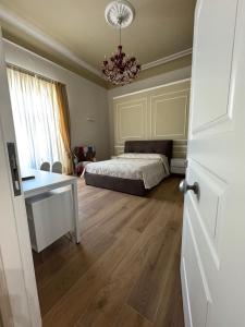 Una cama o camas en una habitación de Le suite del Duomo - 2