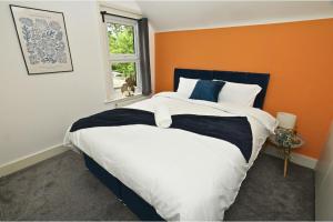 En eller flere senge i et værelse på The Haven Ten -Stylish Escape -Free WiFi - Parking + 26 billeder