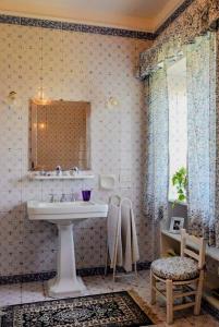 a bathroom with a sink and a mirror at Villa Giulia in Pozzuoli +38 photos