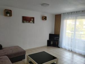 Posezení v ubytování Résidence calme avec piscine