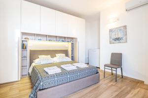 Postel nebo postele na pokoji v ubytování B&B Punta Stilo
