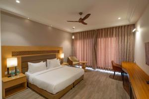 Lova arba lovos apgyvendinimo įstaigoje Excel Hotels & Resorts, Corbett