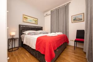 Postel nebo postele na pokoji v ubytování Split Ann Apartments