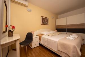 Postel nebo postele na pokoji v ubytování Split Ann Apartments