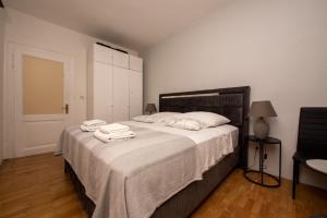 Postel nebo postele na pokoji v ubytování Split Ann Apartments