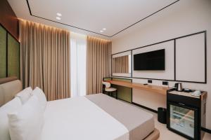 TV a/nebo společenská místnost v ubytování Hotel Jaroal