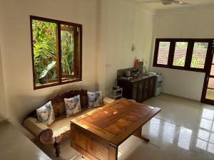 Χώρος καθιστικού στο Villa Thasha