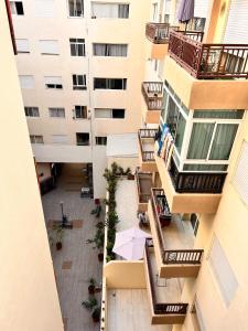 an overhead view of an apartment building with balconies at Suite Horizon in Mohammedia