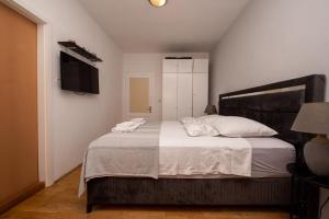 Postel nebo postele na pokoji v ubytování Split Ann Apartments