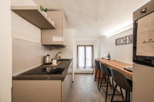 Köök või kööginurk majutusasutuses Maison La Pomposa Suite