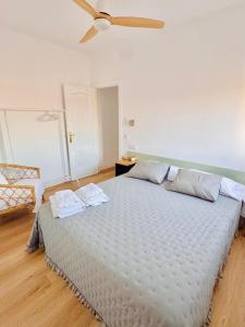 a bedroom with a large bed with two pillows on it at Placeta Serna La Buena Vista in Vélez Rubio
