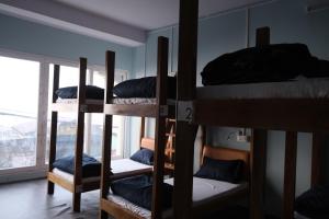 Postel nebo postele na pokoji v ubytování Tara Circle Hostel