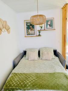 Postel nebo postele na pokoji v ubytování Comme une Douce Parenthèse