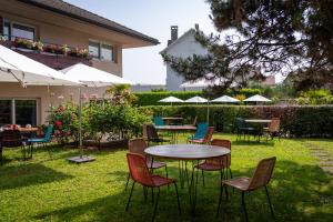Zahrada ubytování Logis Hotel Arc En Ciel
