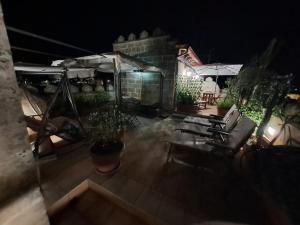 an overhead view of a patio at night at Il Castello te Lu Sannà in Merine