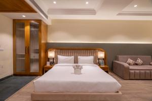 Lova arba lovos apgyvendinimo įstaigoje Excel Hotels & Resorts, Corbett