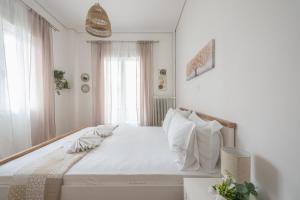 Ένα ή περισσότερα κρεβάτια σε δωμάτιο στο Ble Elia Thiseio Suite