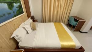 Postel nebo postele na pokoji v ubytování Abaት Guest House