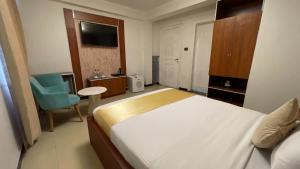 Postel nebo postele na pokoji v ubytování Abaት Guest House