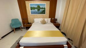 Postel nebo postele na pokoji v ubytování Abaት Guest House