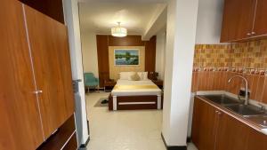 Postel nebo postele na pokoji v ubytování Abaት Guest House