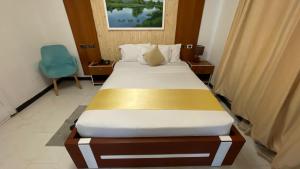 Postel nebo postele na pokoji v ubytování Abaት Guest House