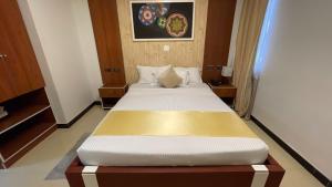 Postel nebo postele na pokoji v ubytování Abaት Guest House