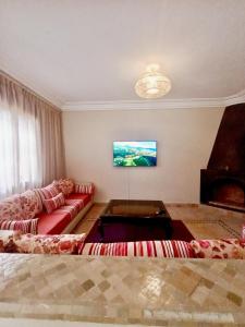 TV a/nebo společenská místnost v ubytování charming mini villa