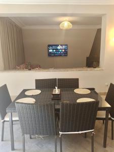 TV a/nebo společenská místnost v ubytování charming mini villa