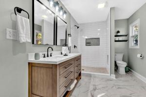 a white bathroom with a sink and a toilet at Welcome to Villa Rosa Farmhouse in Piedmont +63 photos