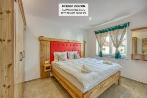 Postel nebo postele na pokoji v ubytování Apartments Viktor