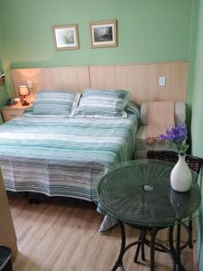 Postel nebo postele na pokoji v ubytování Piemonte Flat 104 B + 27 fotografií