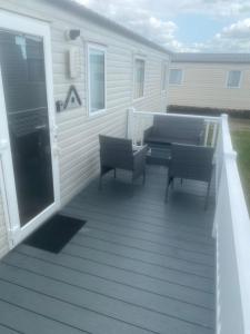Балкон или терраса в Seawick Holiday Park +3 фотографии
