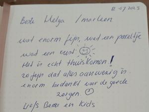 a handwritten document with handwriting on a sheet of paper at The Jacob House in Maldegem