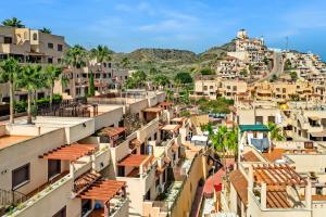 an aerial view of a city with buildings at Oasis in Los Collados - 2BR - Pool & Garden in Águilas