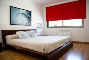 Ένα ή περισσότερα κρεβάτια σε δωμάτιο στο Ca na Xisca Holidays