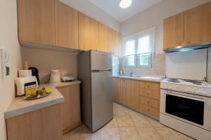 Η κουζίνα ή μικρή κουζίνα στο Maria's cozy house +26 φωτογραφίες