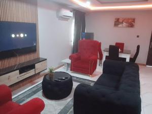 TV a/nebo společenská místnost v ubytování Prestige Haven