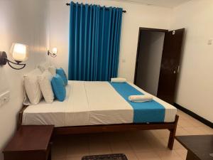 Letto o letti in una camera di Hotel Coral Bay