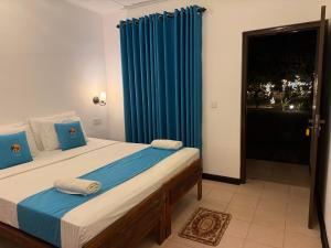 Letto o letti in una camera di Hotel Coral Bay