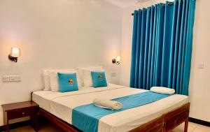Letto o letti in una camera di Hotel Coral Bay