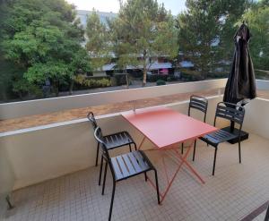 En balkon eller terrasse på L'Élégance à La Bauloise - proche plage - parking privé