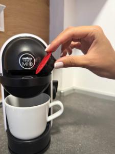 Coffee and tea making facilities at Lamda Deluxe Apartments