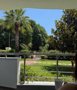 A garden outside Lamda Deluxe Apartments