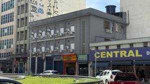 a large building with cars parked in front of it at Senador Plaza Hotel in Sao Paulo +19 photos
