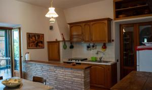 Kuchyň nebo kuchyňský kout v ubytování Le Terrazze + 20 fotografií